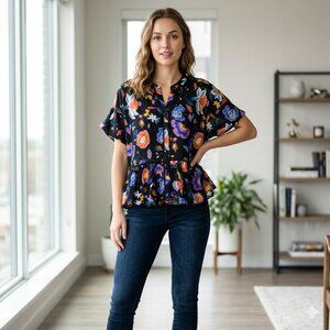 Anthropologie Women's Floral Peplum Blouse Size XS Black Bold Floral Ruffle Hem